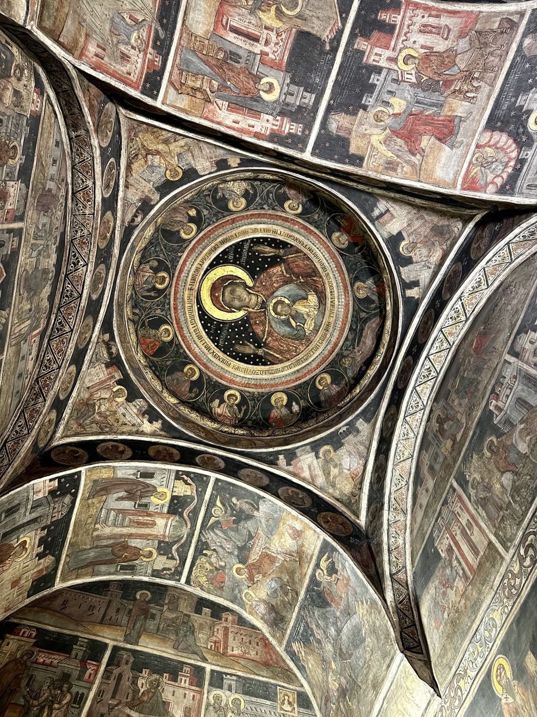 The painted dome of Stavropoleos church, with the Virgin and Child surrounded by saints